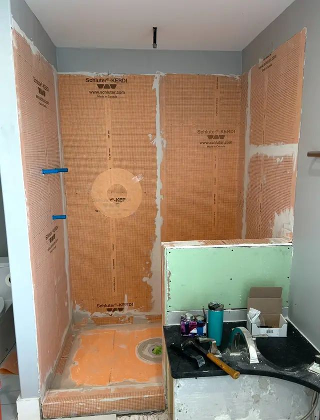What Sits Behind the Tile: How a Walk-In Shower Is Waterproofed